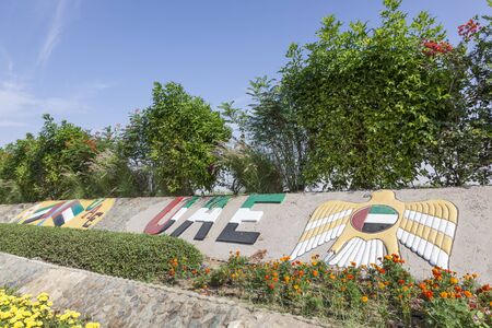 UAE national flags monument in a roundabout in Liwa Oasis. Emirate of Abu Dhabi, United Arab Emirates, Middle Eastの写真素材