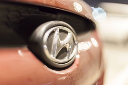 ABU DHABI, UAE - NOV 26, 2016: Hyundai company logo illuminated at night. Shallow Depth of Fieldのeditorial素材