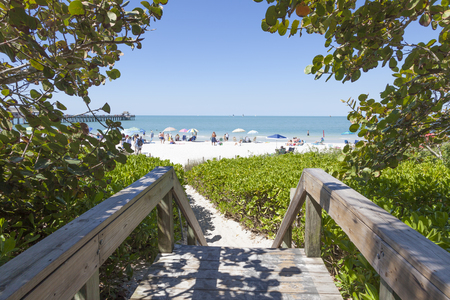 Naples, Fl, USA - March 18, 2017: Access path to the beautiful white sand beach in Naples. Florida, United Statesのeditorial素材