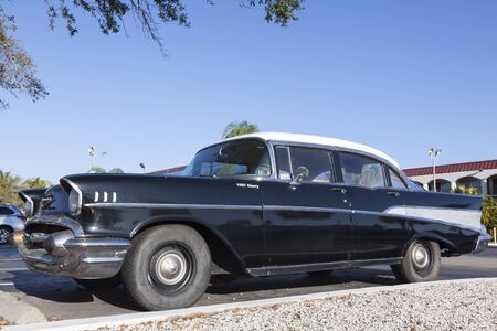 Naples, Fl, USA - March 18, 2017: Black 1957 Chevrolet Belair parked on the street in Naples, Florida, United Statesのeditorial素材