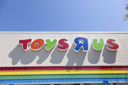 Naples, Fl, USA - March 19, 2017: Toys R Us corporate logo on a branch store in the city of Naples. Florida, United Statesのeditorial素材