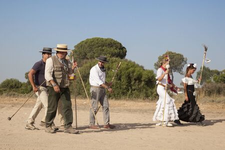 El Rocio, Spain - June 1, 2017: Pilgrims in traditional spanish dress on the road to El Rocio during the Romeria 2017. Province of Huelva, Almonte, Andalusia, Spainのeditorial素材