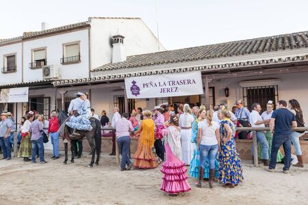El Rocio, Spain - June 4, 2017: Group of pilgrims in traditional spanish dress in El Rocio during the Romeria 2017. Province of Huelva, Almonte, Andalusia, Spainのeditorial素材