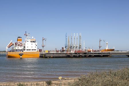 Oil tanker in the industrial port of Huelva, Spainの写真素材