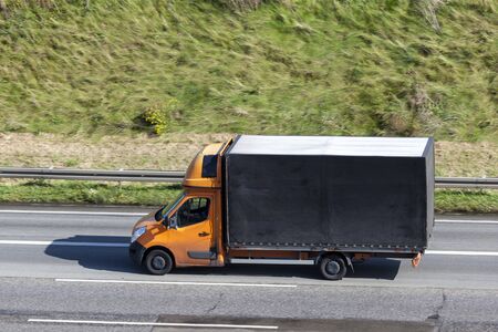 Small truck driving on the highwayのeditorial素材