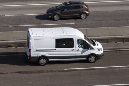Frankfurt, Germany - Sep 19, 2017: White Ford Transit delivery van driving on the highway in Germanyのeditorial素材