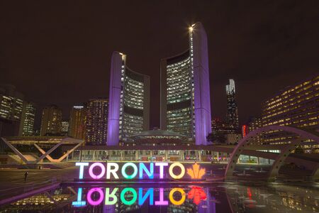 Toronto, Canada - Oct 10, 2017: Colorful illuminated Toronto sign at the Nathan Phillips Square in Toronto, Canadaのeditorial素材