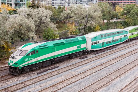 Toronto, Canada - Oct 11, 2017: Go Transit train leaving the city of Toronto. Province of Ontario,...
