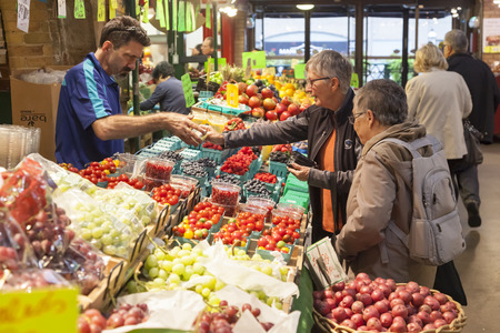 Toronto, Canada - Oct 13, 2017: Fruits and vegatebles stand at the St Lawrence Market in Toronto, Canadaのeditorial素材