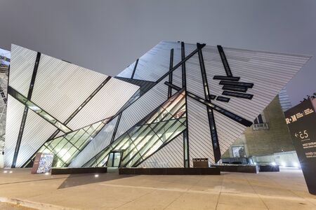 Toronto, Canada - Oct 13, 2017: Exterior of the Royal Ontario Museum (ROM) illuminated at night. City of Toronto, Canadaのeditorial素材