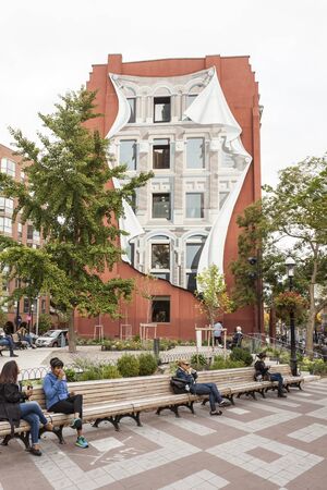 Toronto, Canada - Oct 13, 2017: Face facade painted on the back side of the Gooderham Flat Iron Building in Toronto, Canadaのeditorial素材