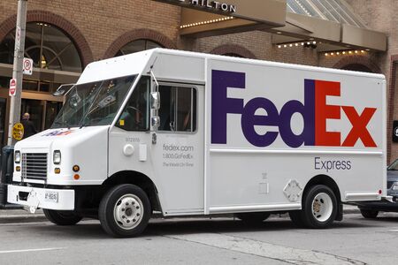Toronto, Canada - Oct 14, 2017: FedEx delivery truck in the city of Toronto. Province of Ontario, Canadaのeditorial素材