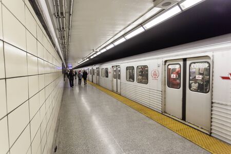 Toronto, Canada - Oct 17, 2017: Subway train at a underground station in the city of Toronto, Canadaのeditorial素材