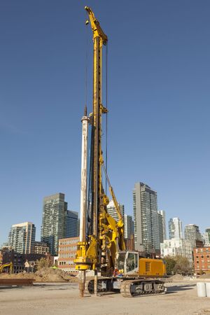 Big drilling machine on a construction site in the city