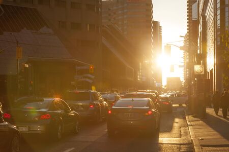 Toronto, Canada - Oct 21, 2017: Rush hour in Toronto downtown financial district at sunset. City of Toronto, Canadaのeditorial素材
