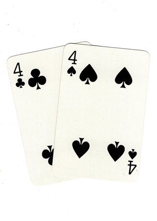 Vintage playing cards showing a pair of black fours isolated on a white background.