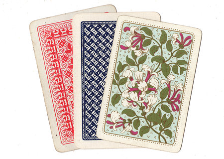 Vintage playing card backs on a white background.