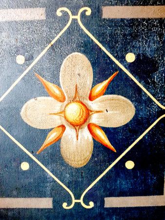 Detail of a yellow flower design on a dark blue background.の写真素材