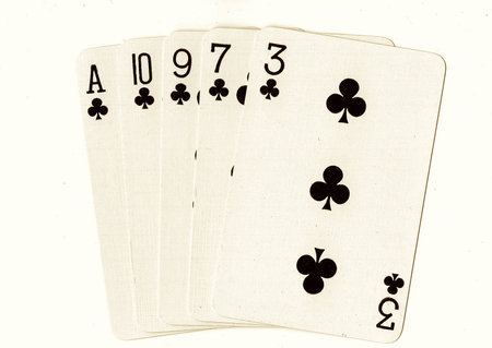 Playing cards isolated on a white background, closeup of photo.
