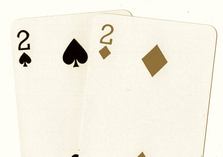Playing cards, two of a kind, isolated on a white background