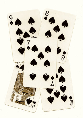old playing cards on a white background, close-up, vintageの写真素材