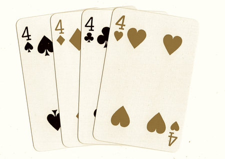 Playing cards on a white background, close-up of aces