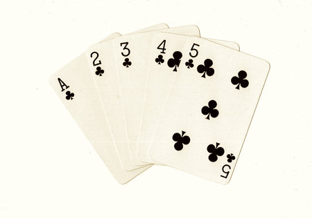 Playing cards on a white background, close-up, vintage style