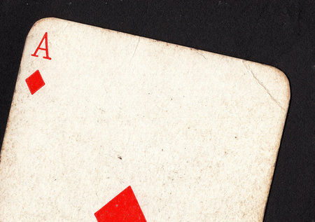 Old playing cards on a black background. Close-up image.の写真素材
