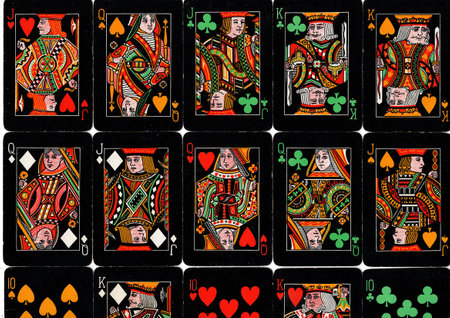 Playing cards on black background. Seamless pattern. Vector illustration.