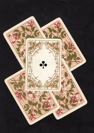 Playing cards on a black background, top view. Vintage style.