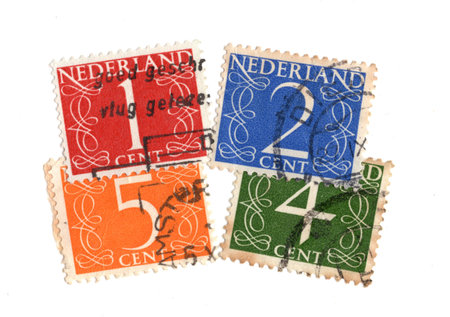 Vintage postage stamps from The Netherlands isolated on a white background.の写真素材