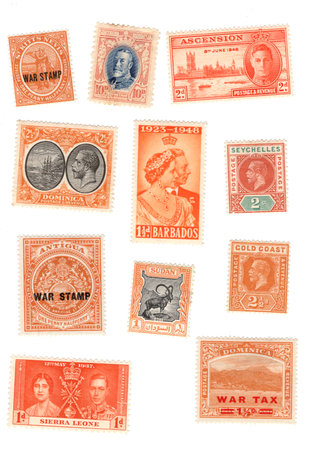 Vintage postage stamps from around the world isolated on a white background.の写真素材