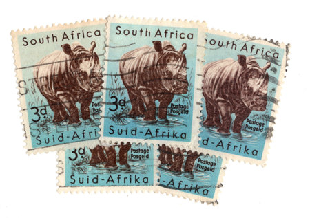 Vintage postage stamps from South Africa isolated on a white background.