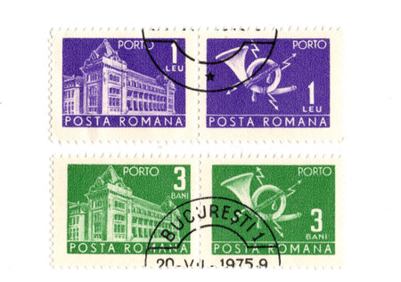 Vintage postage stamps from Romania isolated on a white background.