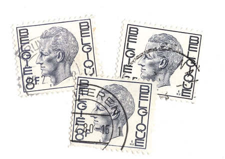 Vintage postage stamps from Belgium isolated on a white background.