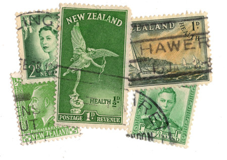 Vintage postage stamps from New Zealand isolated on a white background.