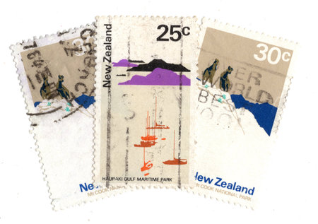 Vintage postage stamps from New Zealand isolated on a white background.