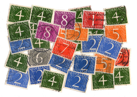 Vintage postage stamps from The Netherlands isolated on a white background.の写真素材