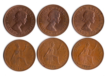 Old coins from Great Britain isolated on a white background.