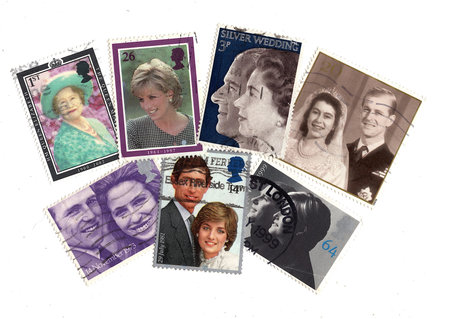 Vintage Queen Elizabeth II postage stamps from Great Britain isolated on a white background.