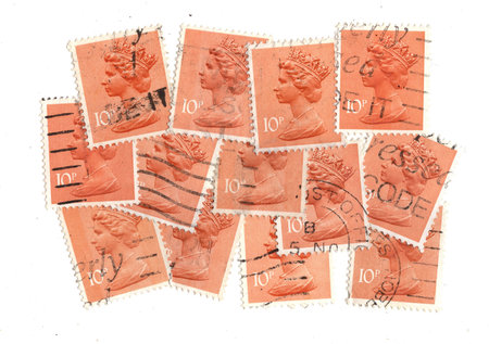 Vintage Queen Elizabeth II postage stamps from Great Britain isolated on a white background.の写真素材