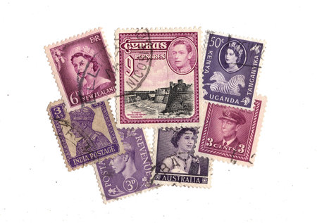 Vintage postage stamps from different countries of the world isolated on whiteの写真素材