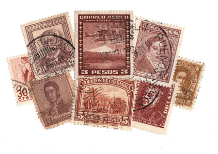 Vintage postage stamps from around the world on a white background.の写真素材