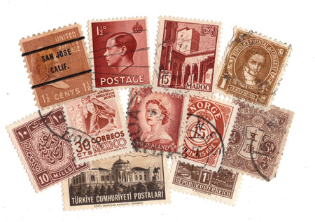 Vintage postage stamps from different countries of the world isolated on whiteの写真素材