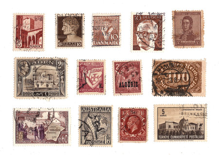 Vintage postage stamps from around the world on a white background.の写真素材