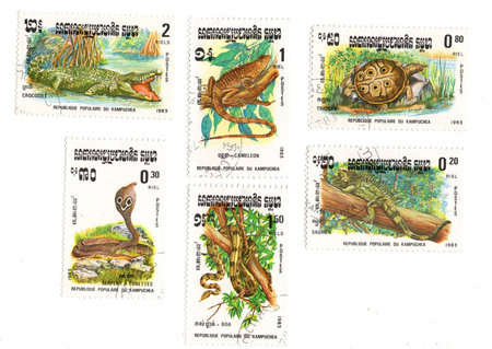 Vintage postage stamps from Kampuchea on a white background.の写真素材