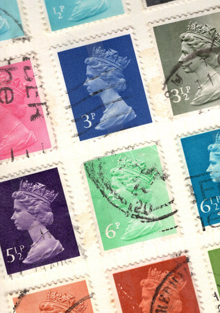 Vintage postage stamps from Great Britain on a white background.の写真素材