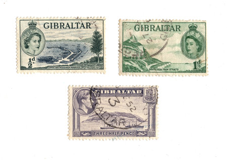 Vintage postage stamps from Gibraltar on a white background.の写真素材