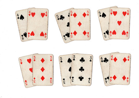 Hands of blackjack or pontoon playing cards in different combinations on a white background.