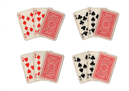 Playing hands of three old grubby playing cards in different combinations on a white background.